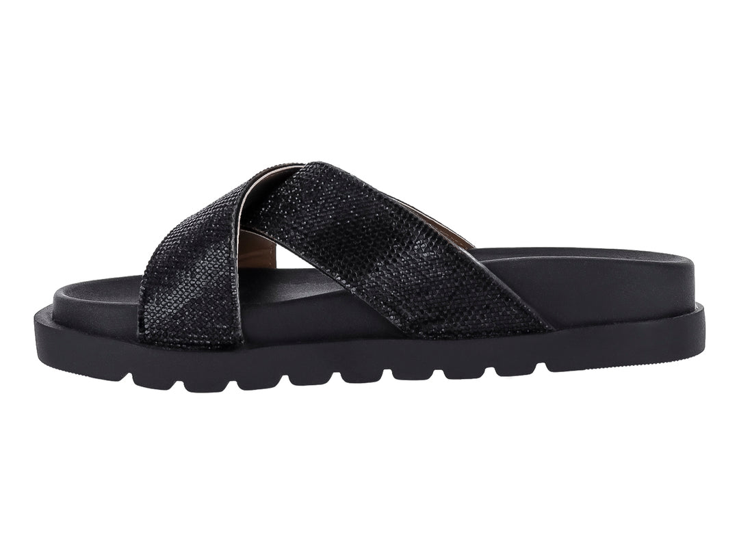 Sandalia negra de plataforma con tiras cruzadas brillantes y suela dentada.