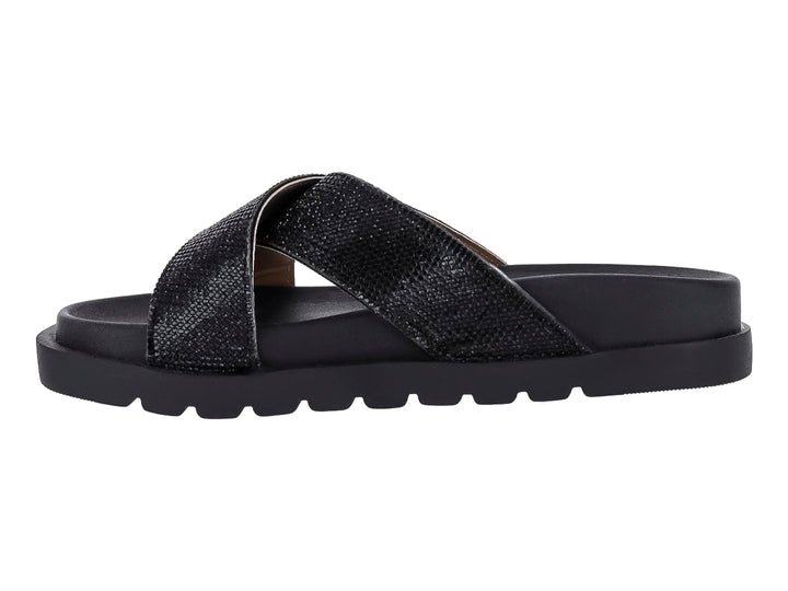 Sandalia negra de plataforma con tiras cruzadas brillantes y suela dentada.
