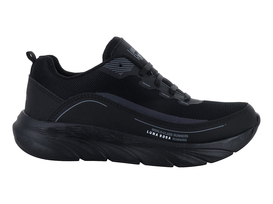 Tenis deportivos Andrax en color negro con detalles en gris y suela robusta.