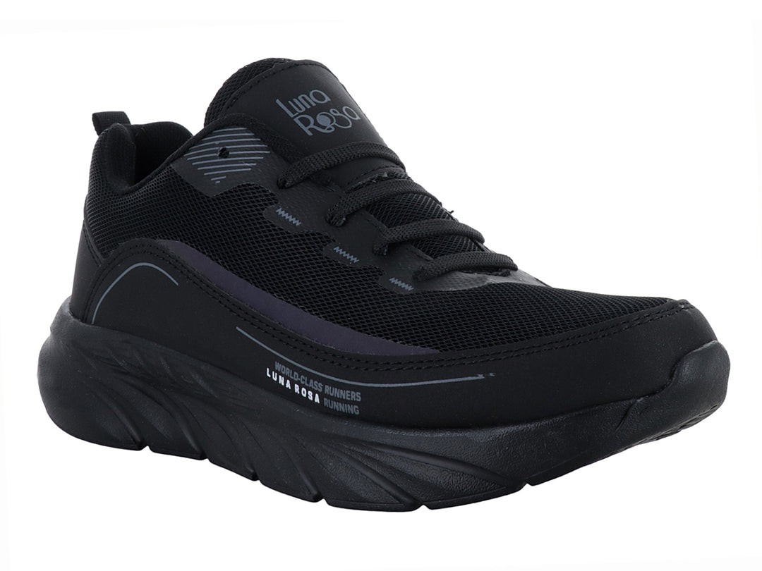 Tenis deportivos Andrax en color negro con detalles en gris y suela robusta.