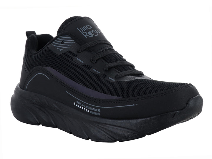 Tenis deportivos Andrax en color negro con detalles en gris y suela robusta.