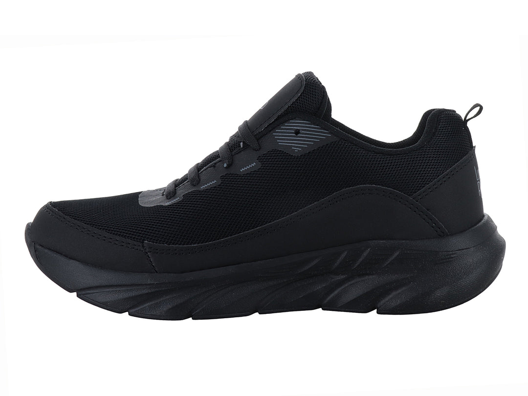 Tenis deportivos Andrax en color negro con detalles en gris y suela robusta.