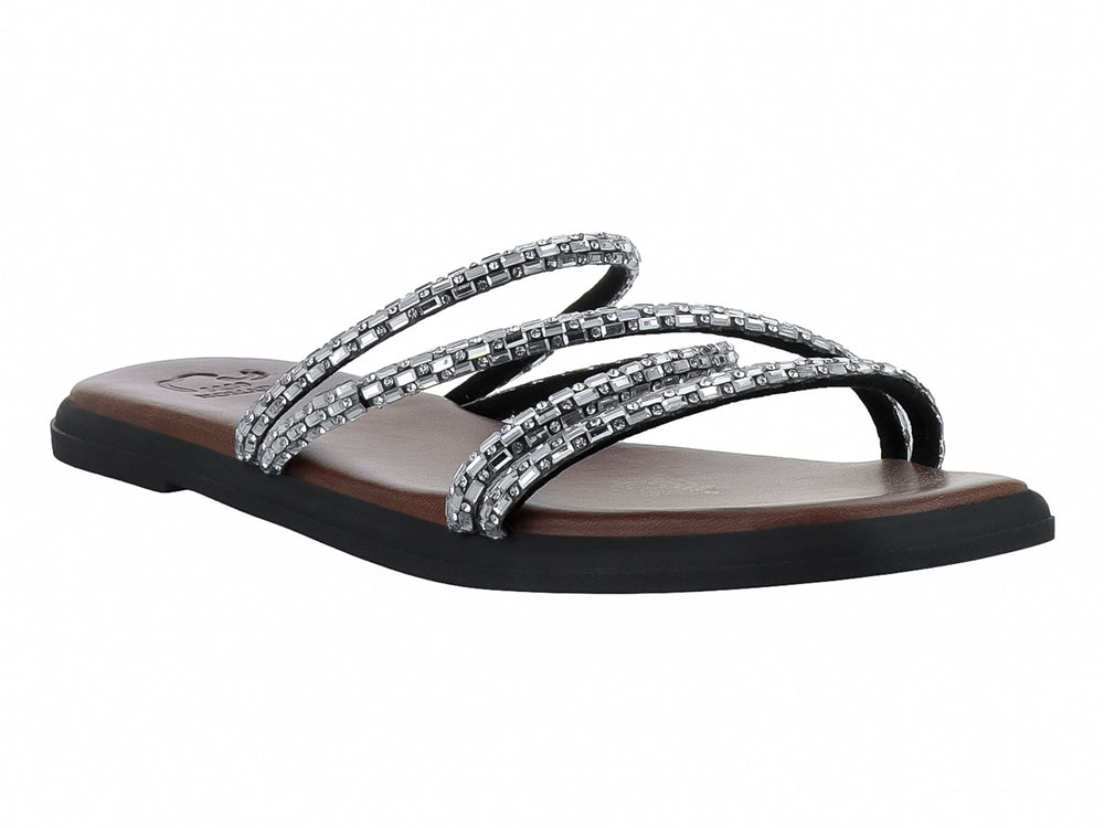 Sandalia plana para Niña en color plata con tiras brillantes y suela negra.