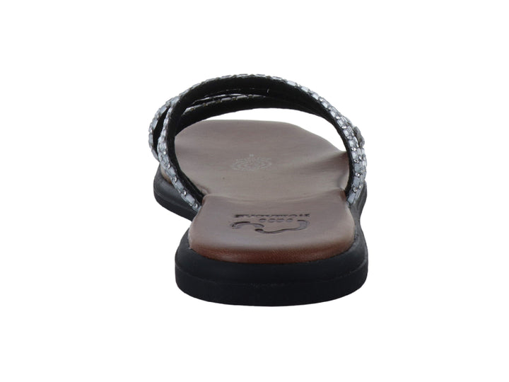 Sandalia plana para Niña en color plata con tiras brillantes y suela negra.