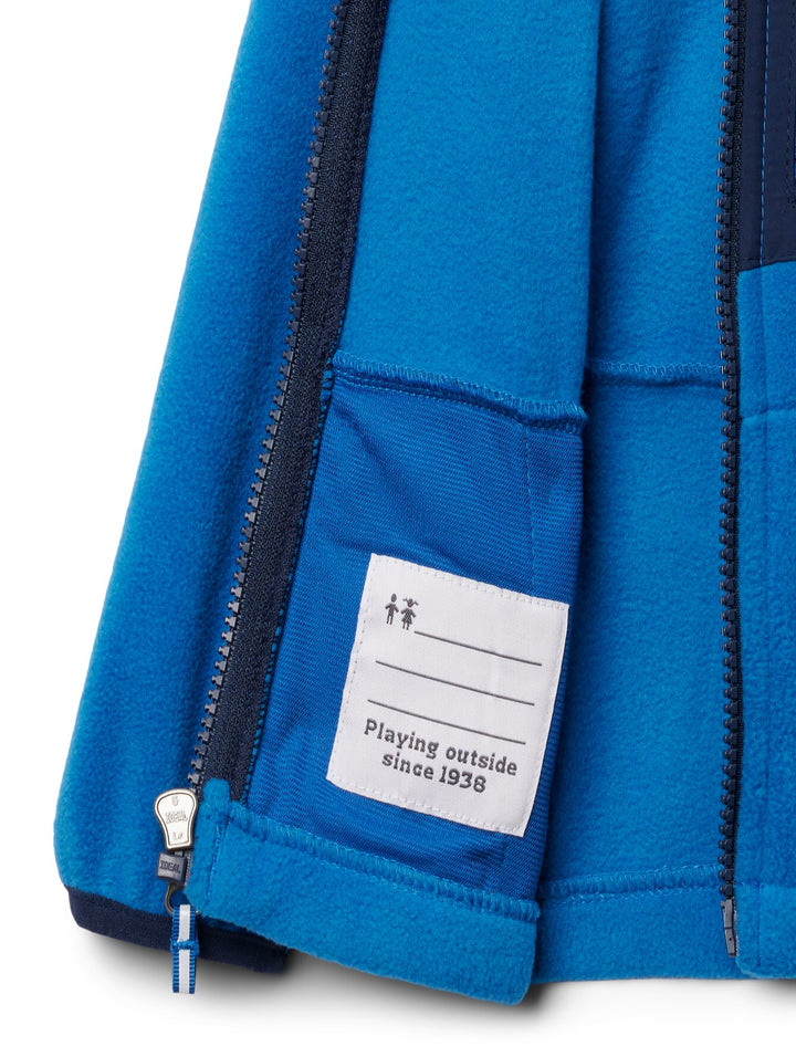 Chaqueta de fleece Columbia color azul brillante con bolsillo frontal en azul marino y cierre completo.