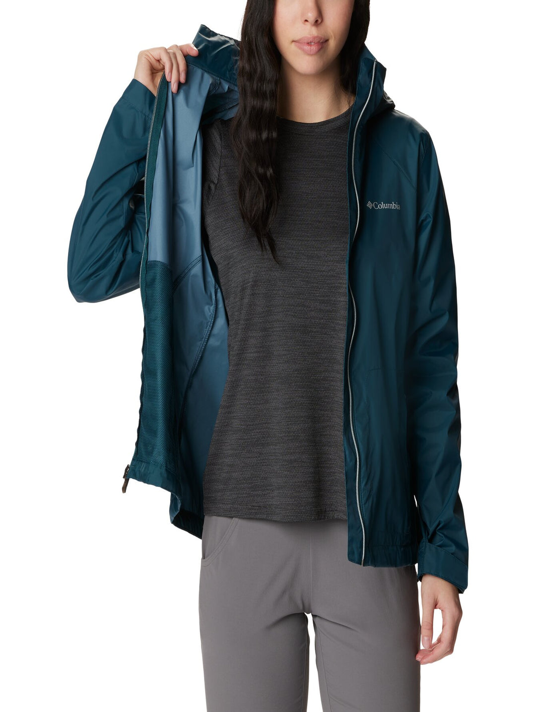 Chaqueta Columbia color azul petróleo con capucha y cierre frontal.