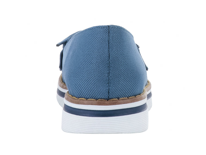 Zapato casual de tela tipo mezclilla color azul con detalle de nudo y suela blanca.