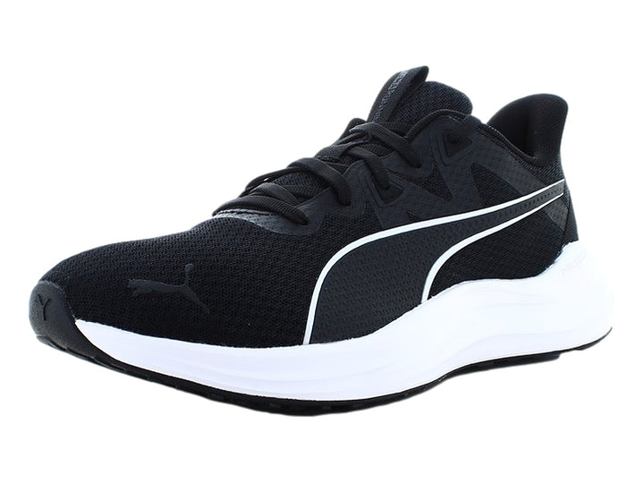 Tenis deportivos PUMA color negro con suela blanca y detalle lateral blanco.