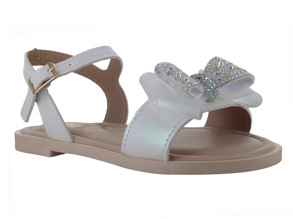 Sandalia blanca para Niña con moño decorado con brillantes y correa ajustable.