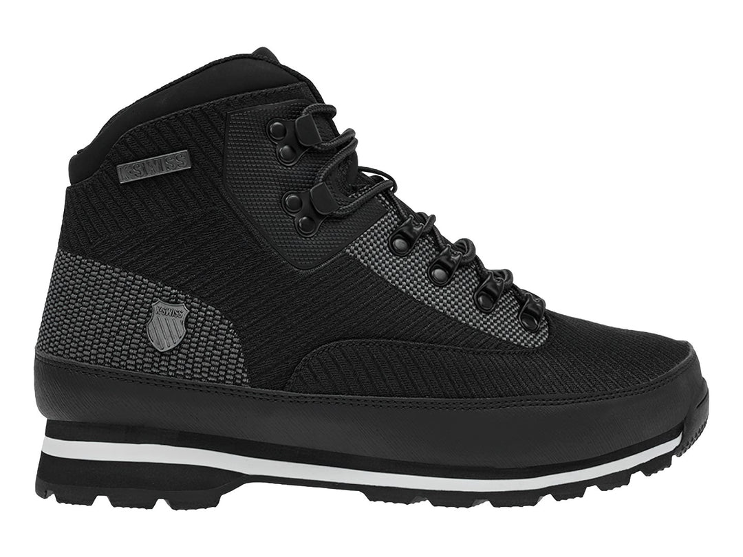 Botas deportivas K-Swiss Rushmore en color negro con suela blanca y detalles texturizados.