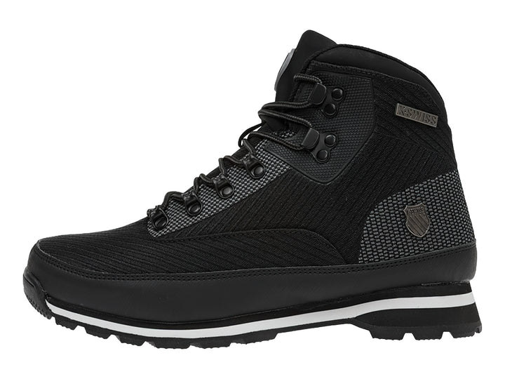 Botas deportivas K-Swiss Rushmore en color negro con suela blanca y detalles texturizados.