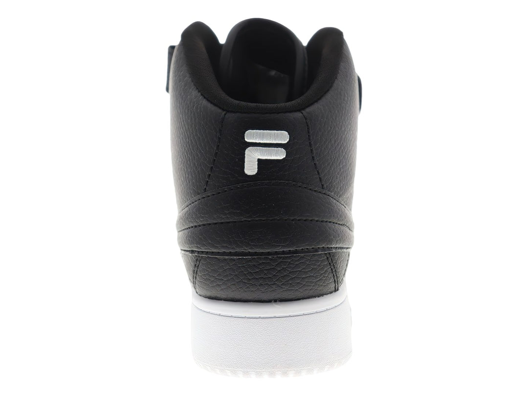 Tenis FILA de corte alto en color negro con suela blanca y correa ajustable en el tobillo.