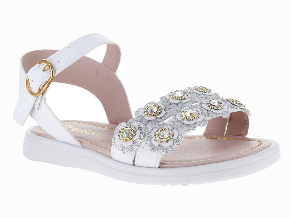 Sandalia blanca para niña con adornos de flores brillantes y hebilla dorada en el tobillo.