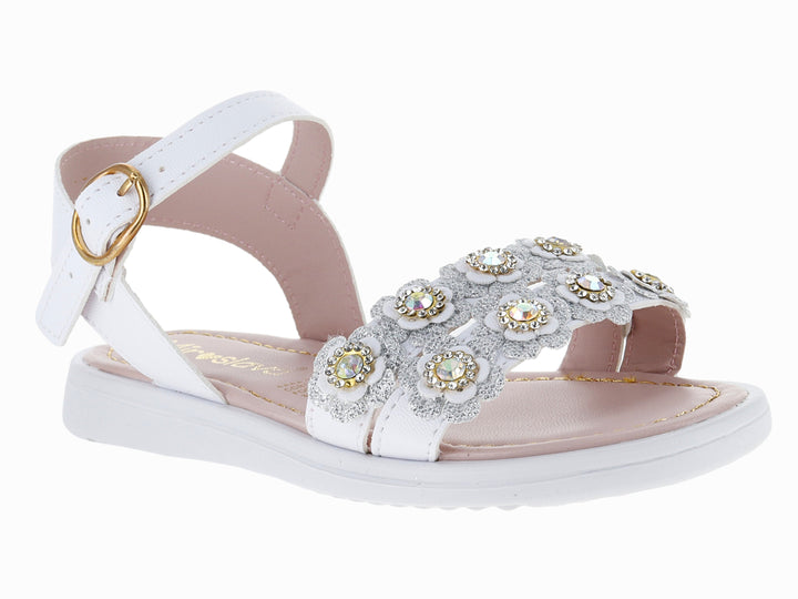 Sandalia blanca para niña con adornos de flores brillantes y hebilla dorada en el tobillo.