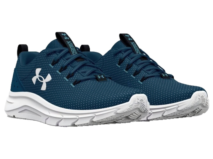 Tenis deportivos Under Armour UA Phade RN 2 en color azul marino con suela blanca.