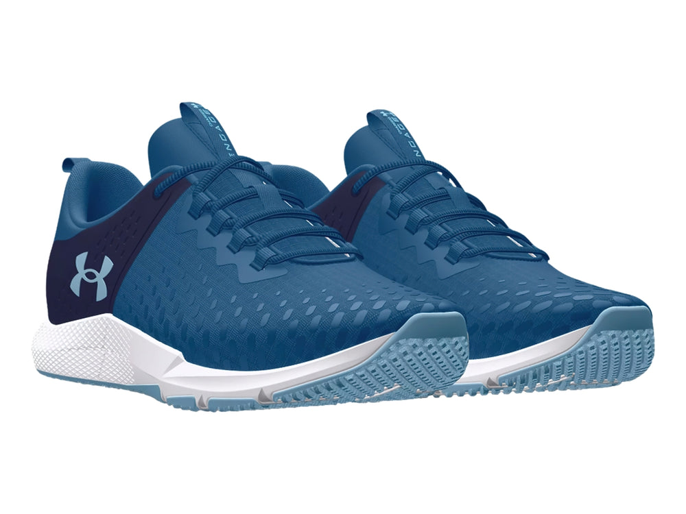 Tenis deportivos Under Armour color azul con suela blanca y detalles en azul marino.
