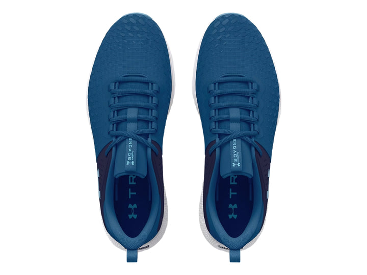 Tenis deportivos Under Armour color azul con suela blanca y detalles en azul marino.