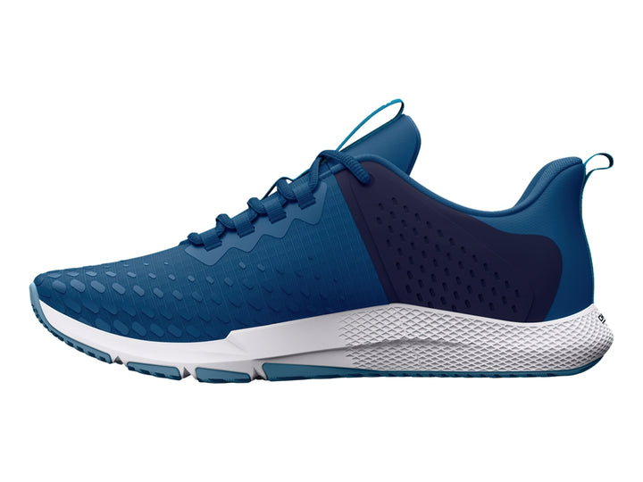 Tenis deportivos Under Armour color azul con suela blanca y detalles en azul marino.