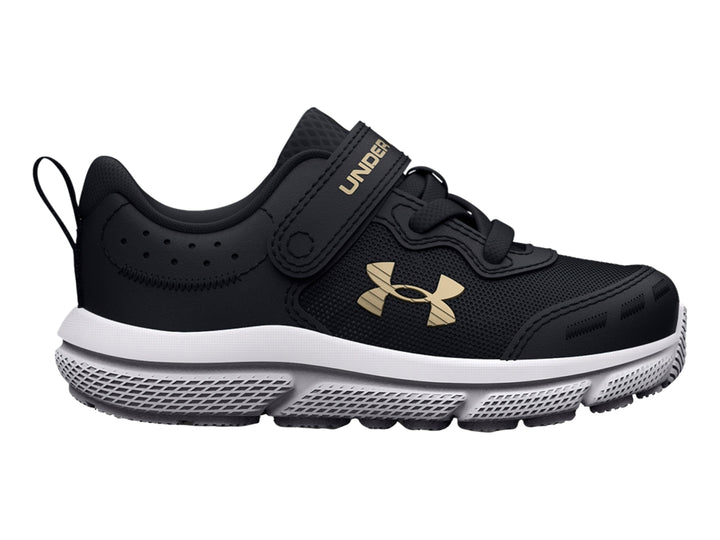 Tenis deportivos Under Armour color negro con suela blanca y logo dorado.