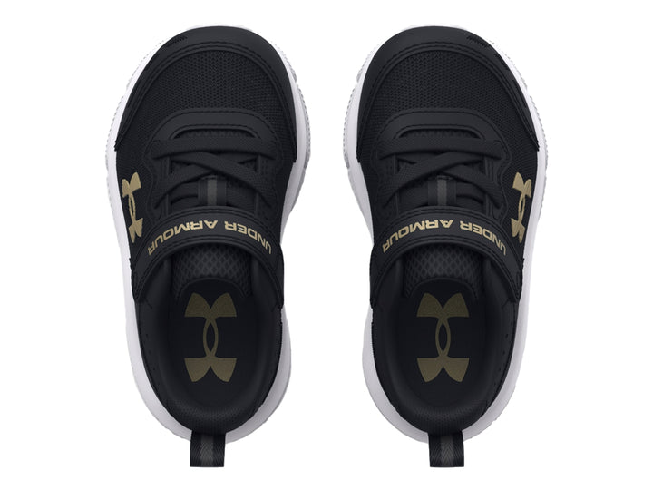 Tenis deportivos Under Armour color negro con suela blanca y logo dorado.