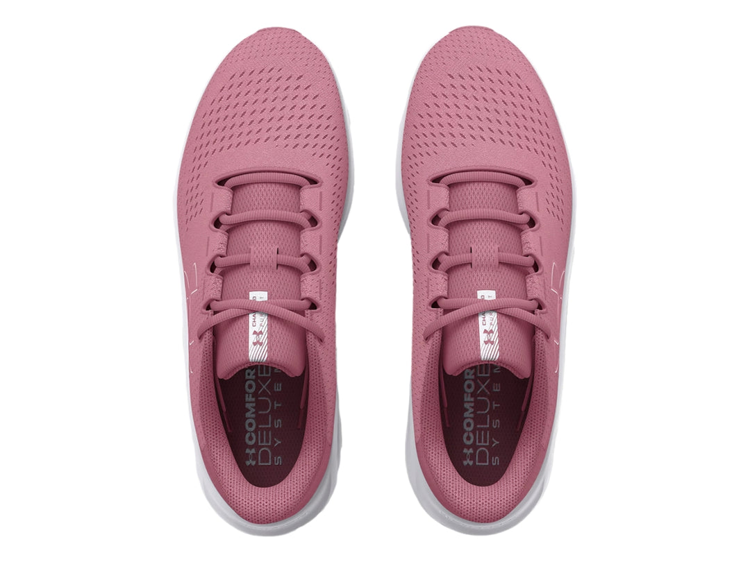 Tenis deportivos Under Armour color rosa con suela blanca y logotipo lateral blanco.