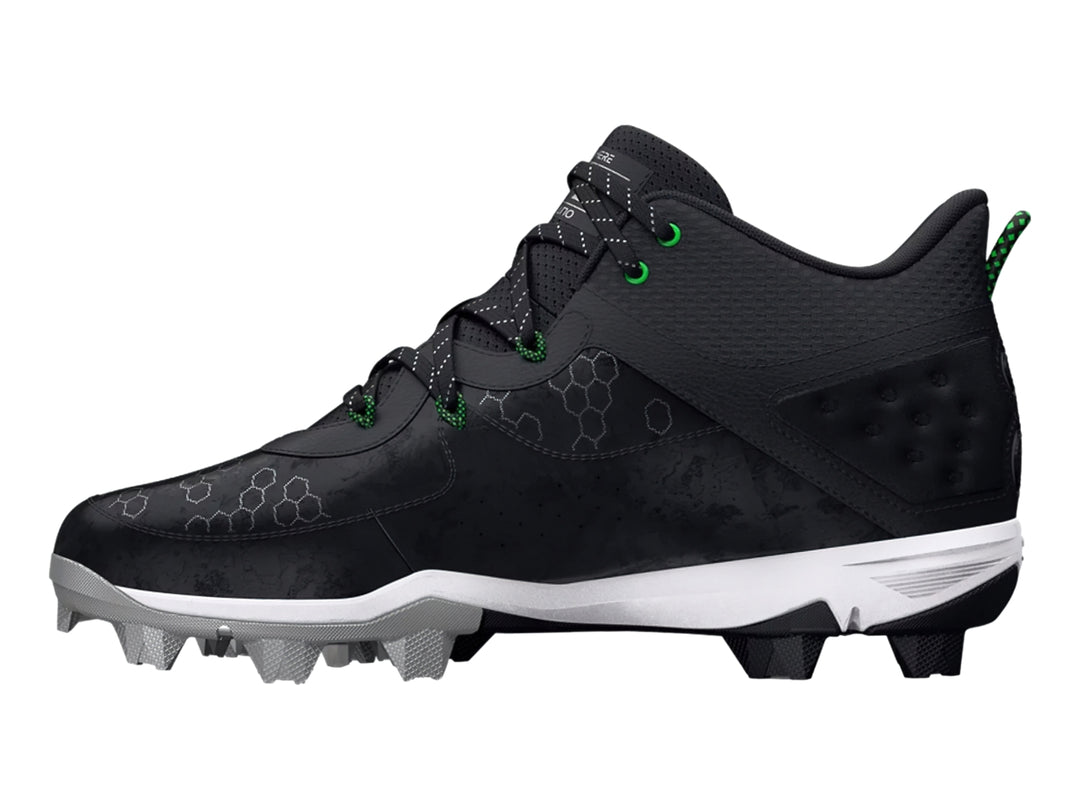 Zapato deportivo Under Armour Harper 8 Mid en color negro con detalles verdes y suela blanca para béisbol.
