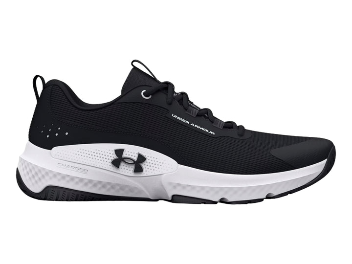 Tenis deportivos Under Armour color negro con suela blanca y logotipo en el costado.