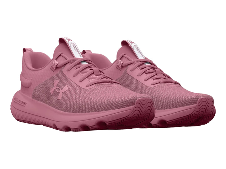 Tenis deportivos Under Armour color rosa Pink Elixir con malla transpirable y suela amortiguada.