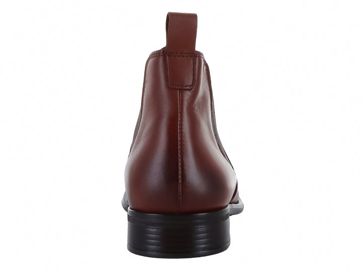 Botín estilo Chelsea de cuero color granate con suela negra y panel elástico lateral.