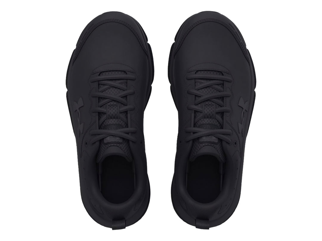 Tenis deportivos Under Armour color negro total para niños, vista lateral.