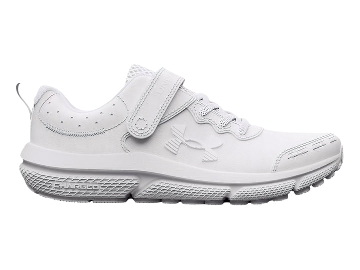Tenis deportivos Under Armour color blanco con cierre de velcro y cordones para niño.