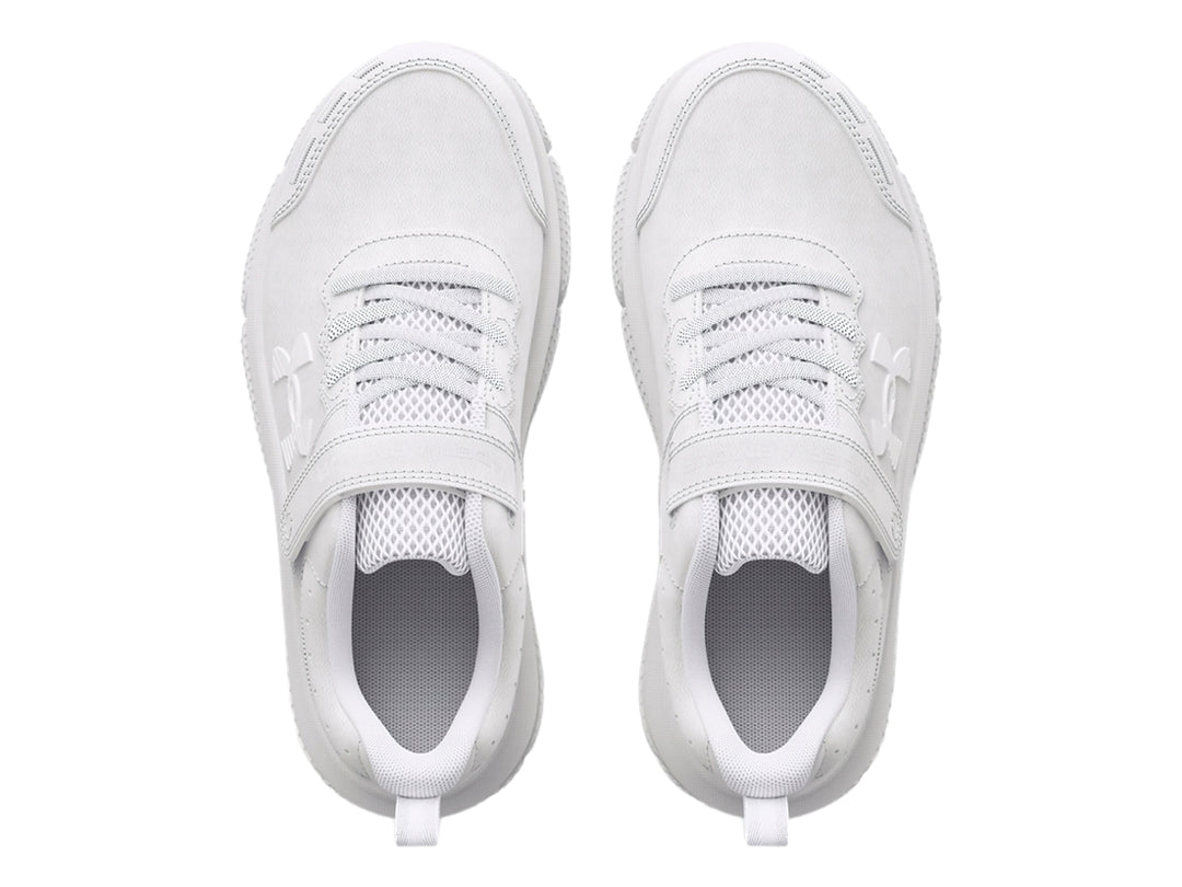 Tenis deportivos Under Armour color blanco con cierre de velcro y cordones para niño.