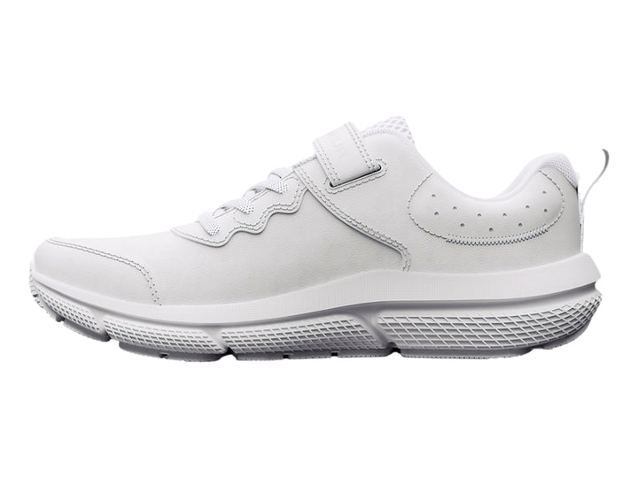 Tenis deportivos Under Armour color blanco con cierre de velcro y cordones para niño.