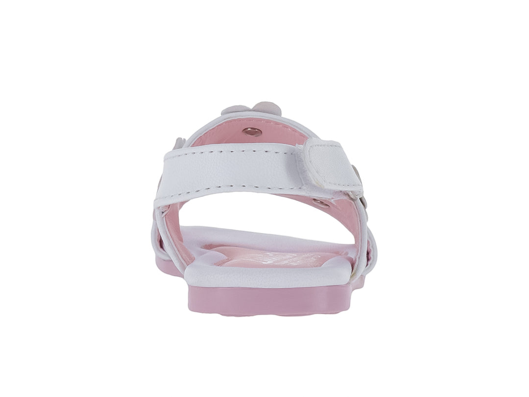 Sandalia blanca para niña con adornos de flores coloridas y suela rosa.