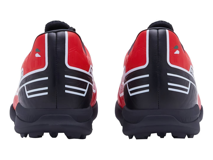 Zapato de fútbol Pirma Brasil color rojo y negro con suela para césped sintético.