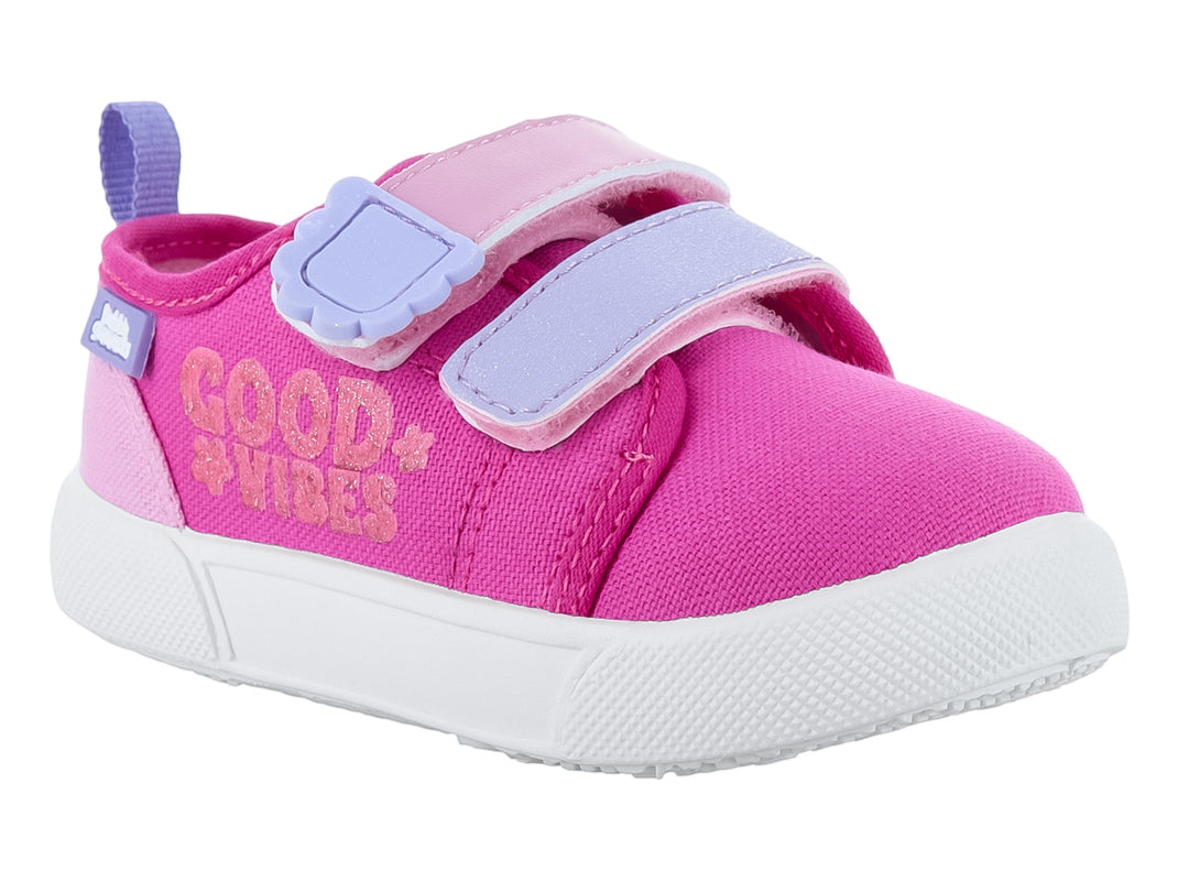 Zapato infantil color fucsia con suela blanca, cierres de velcro y texto &