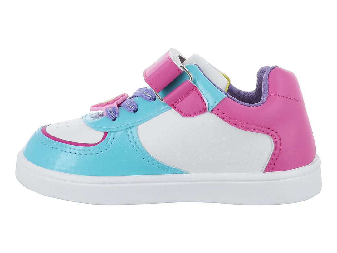 Tenis infantiles multicolor en tonos fucsia y menta con cierre de velcro y estampados decorativos.