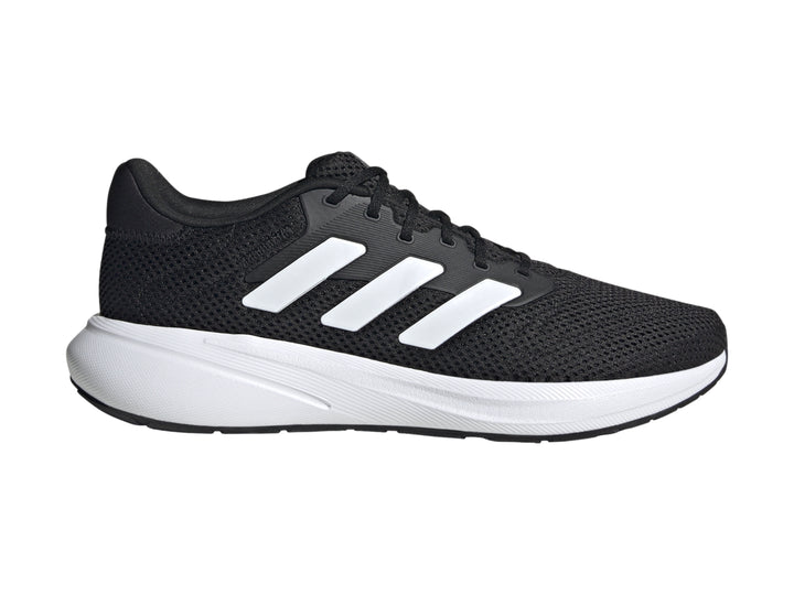 Tenis deportivos Adidas Response Runner color negro con suela y franjas laterales blancas.