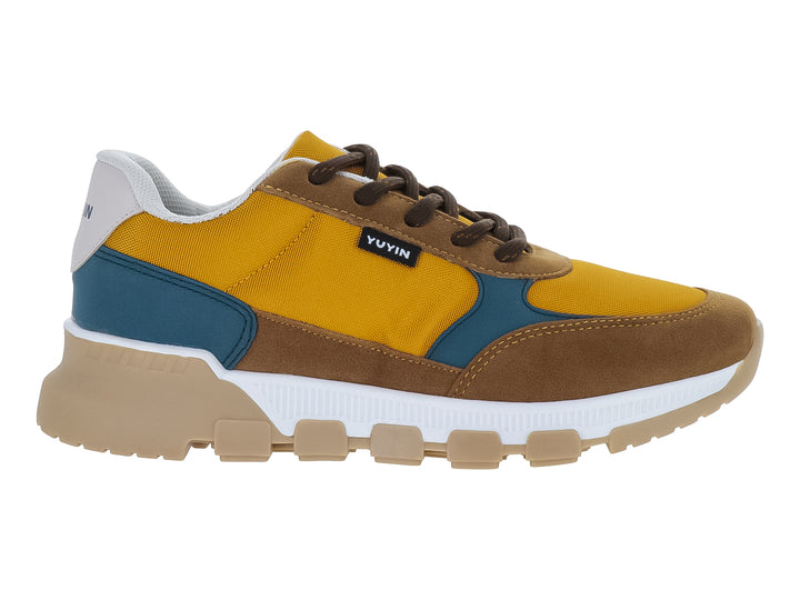 Tenis infantiles YUYIN en colores amarillo, café y azul con suela gruesa beige.