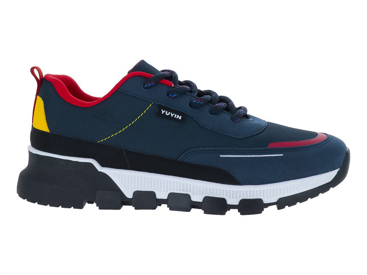 Tenis deportivos infantiles YUYIN en color azul marino con suela blanca y detalles en rojo y amarillo.