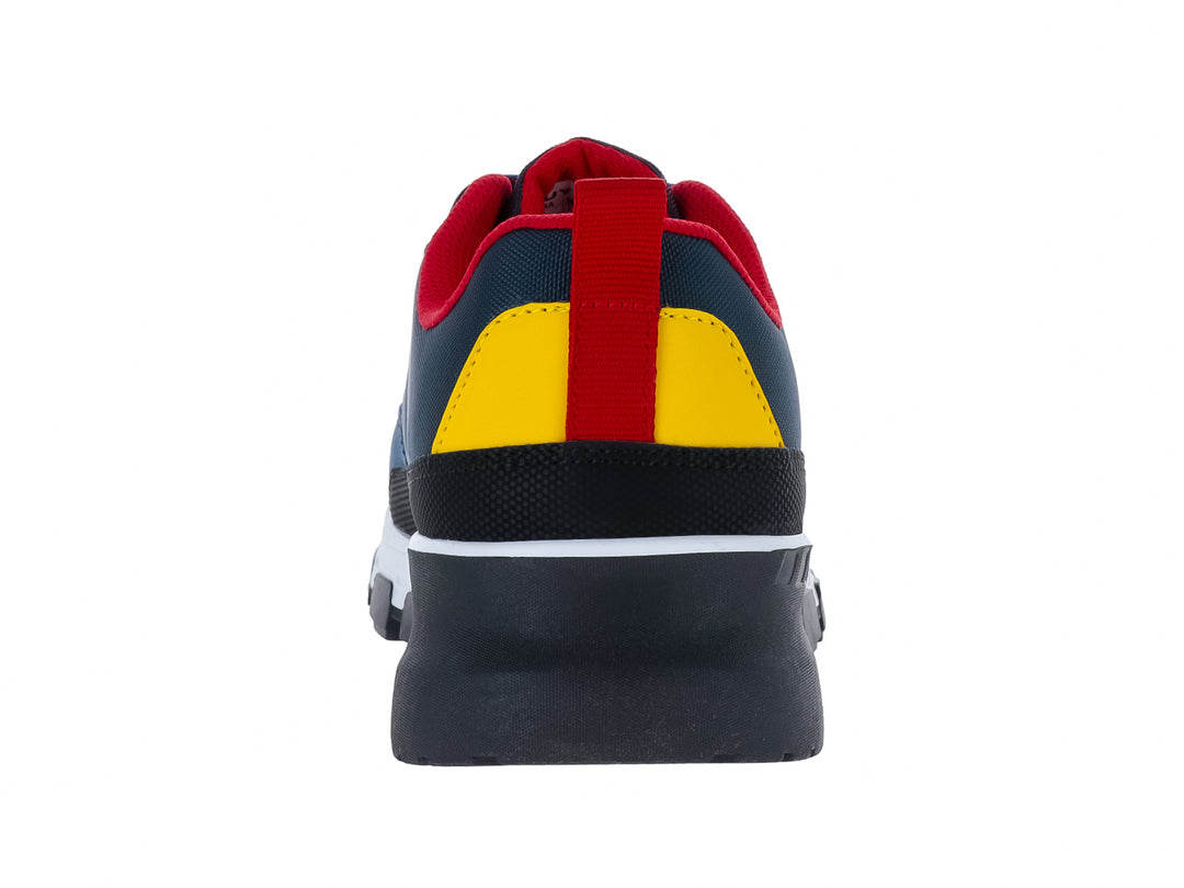 Tenis deportivos infantiles YUYIN en color azul marino con suela blanca y detalles en rojo y amarillo.