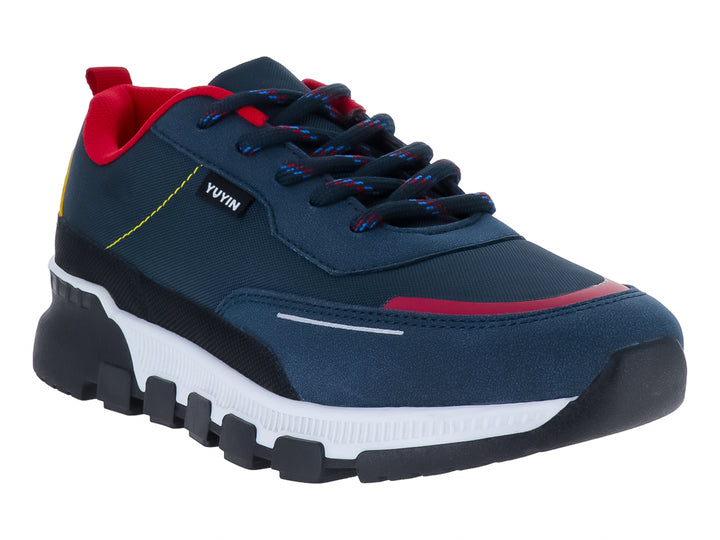 Zapato deportivo YUYIN para niño en color azul marino con detalles en rojo y amarillo y suela blanca.