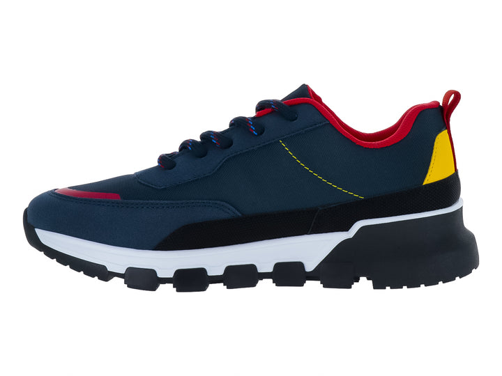 Zapato deportivo YUYIN para niño en color azul marino con detalles en rojo y amarillo y suela blanca.