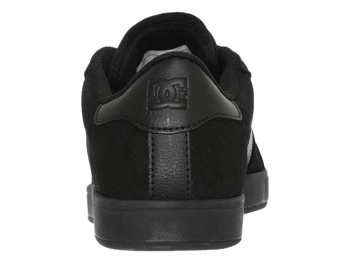 Tenis DC Shoes modelo Adys en color negro sólido con suela plana y acabado mate.