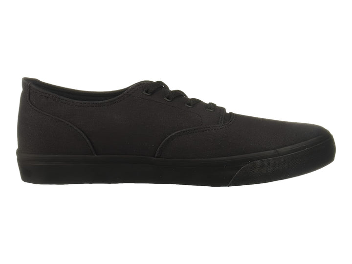 Zapato DC Shoes modelo Adys en color negro total, estilo casual con cordones y suela plana.