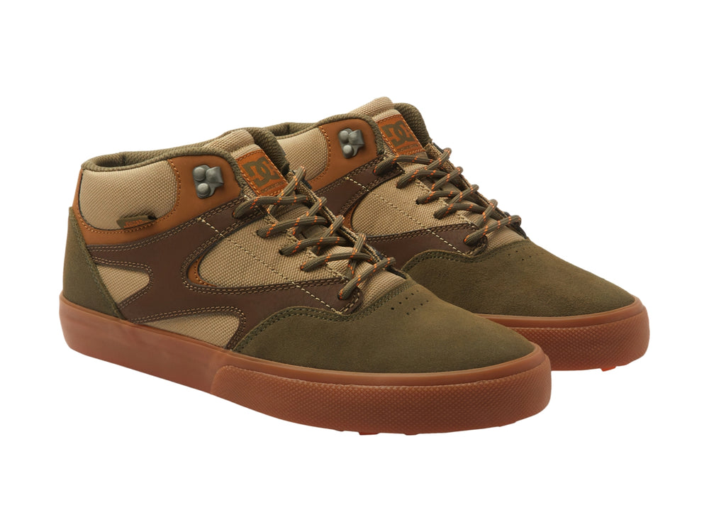 Tenis DC Shoes Kalis Vulc Mid en tonos café y beige con suela vulcanizada color canela.