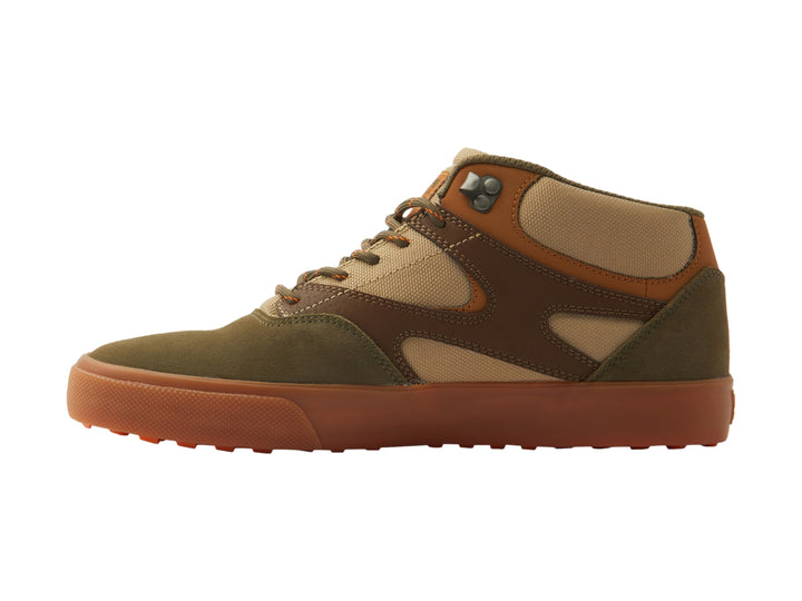 Tenis DC Shoes Kalis Vulc Mid en tonos café y beige con suela vulcanizada color canela.