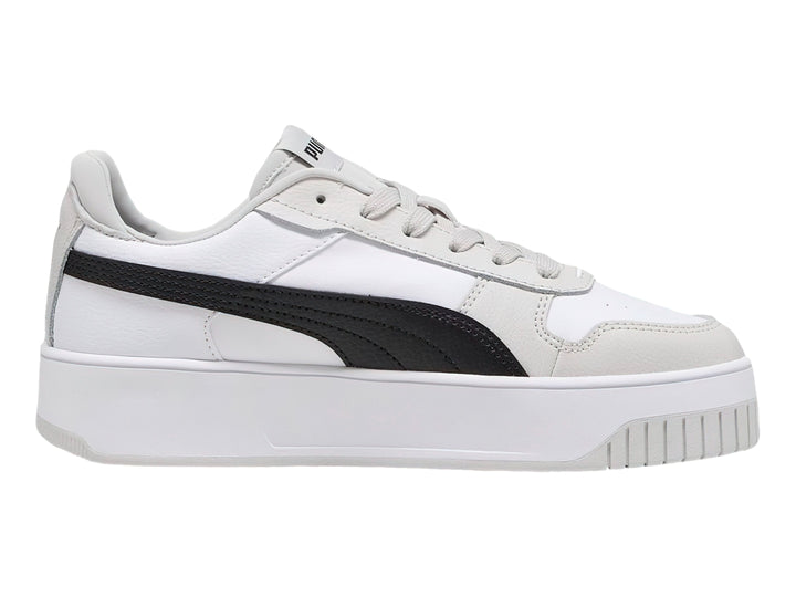 Tenis PUMA Carina Street blancos con franja negra y detalles en gris, con suela de plataforma.