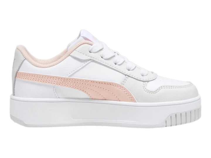 Tenis PUMA Carina Street para niña en color blanco con detalles en rosa y suela de plataforma blanca.
