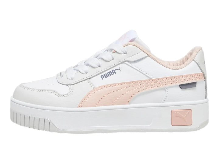 Tenis PUMA Carina Street para niña en color blanco con detalles en rosa y suela de plataforma blanca.